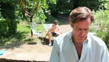 Oliver and Elio in the garden with the peach tree